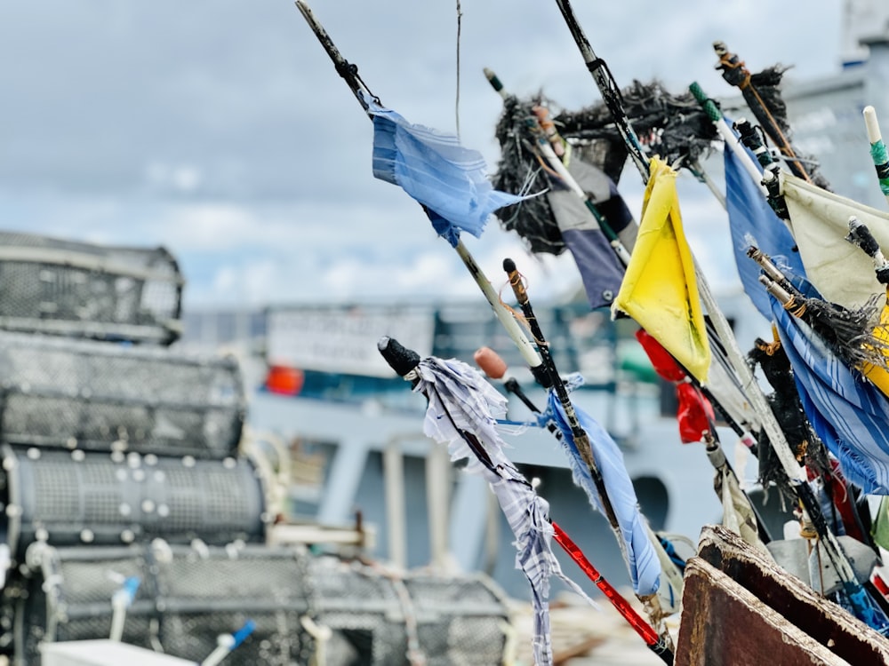 a bunch of flags that are on a boat