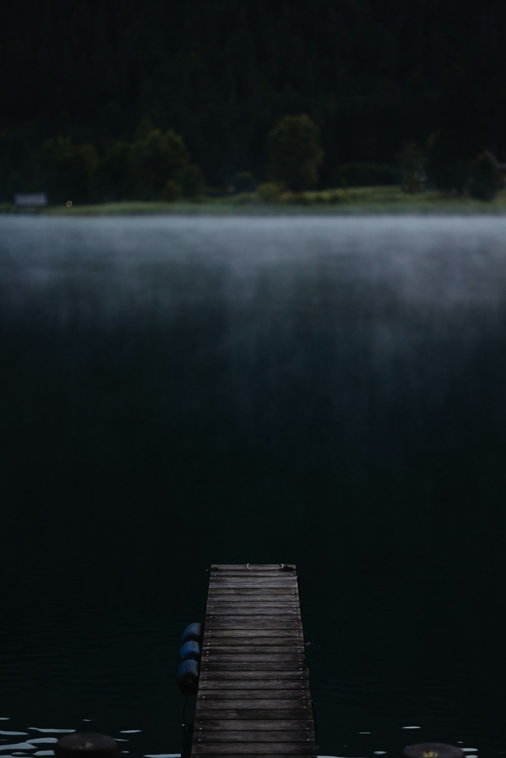 a dock sitting on top of a body of water