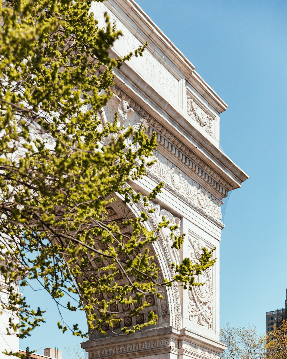 a tall clock tower towering over a city