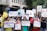 A diverse group of people are gathered for a protest or awareness event, holding various colorful signs advocating for disability rights and inclusion. Some signs have text promoting the inclusion of individuals with disabilities in sports and society, with messages like 'I want to turn my disability into ability' and 'Support Disability Rights.' The participants appear engaged and passionate about the cause.