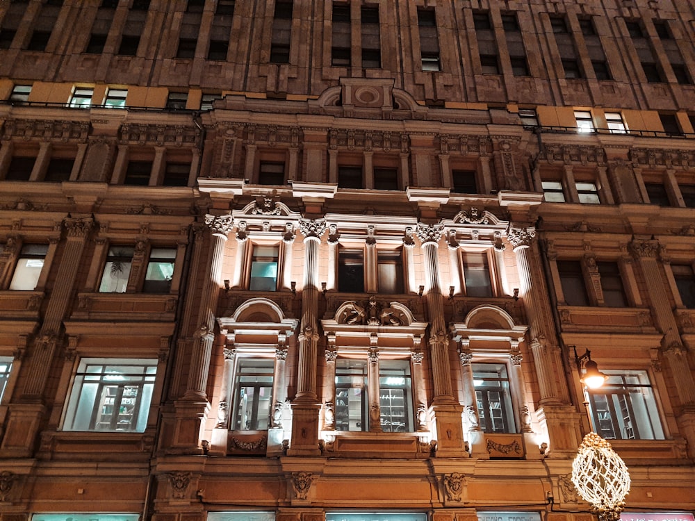 a tall building with a clock on the front of it