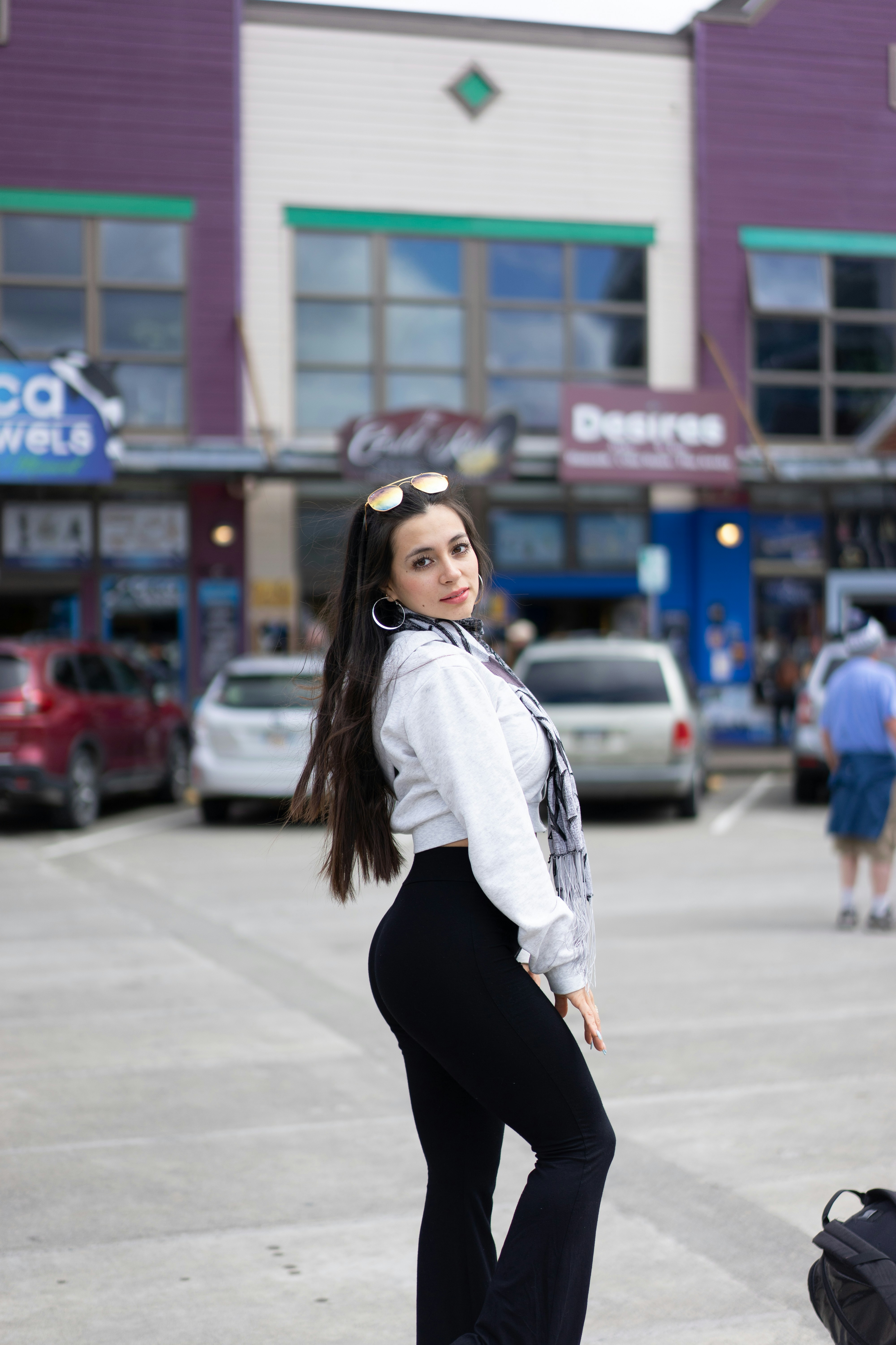 Young woman with long hair, casual outdoor portrait