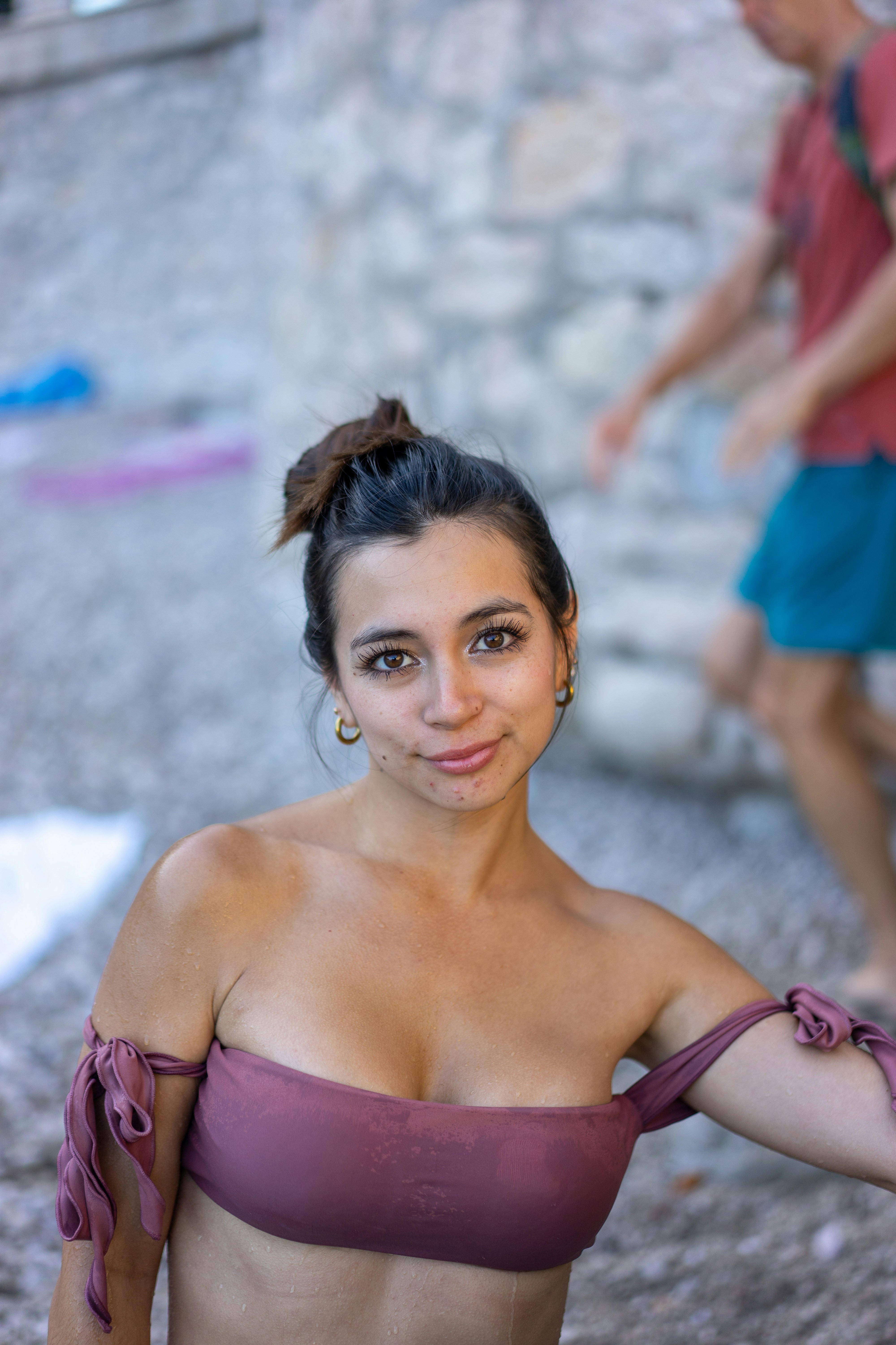 a woman in a bikini posing for a picture