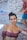 a woman in a bikini posing for a picture