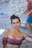 a woman in a bikini posing for a picture