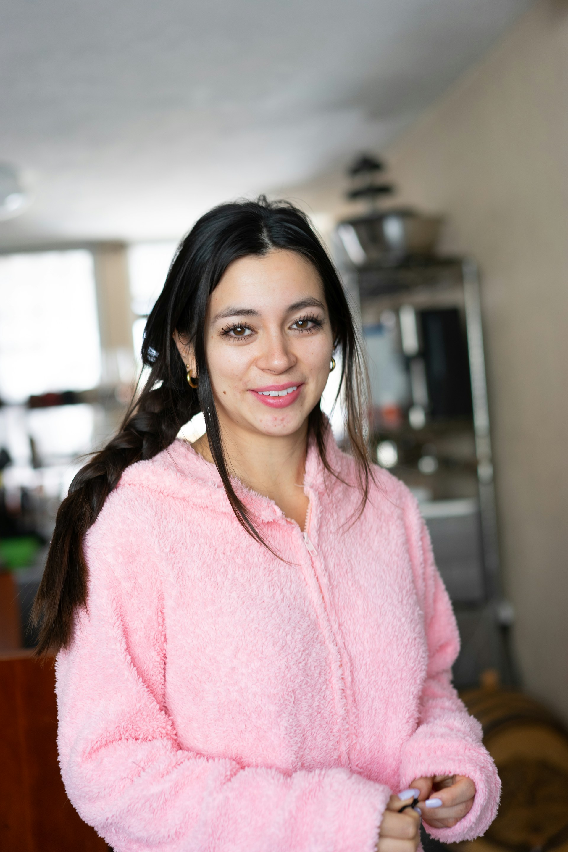 woman wearing yellow long-sleeved dress under white clouds and blue sky during daytime