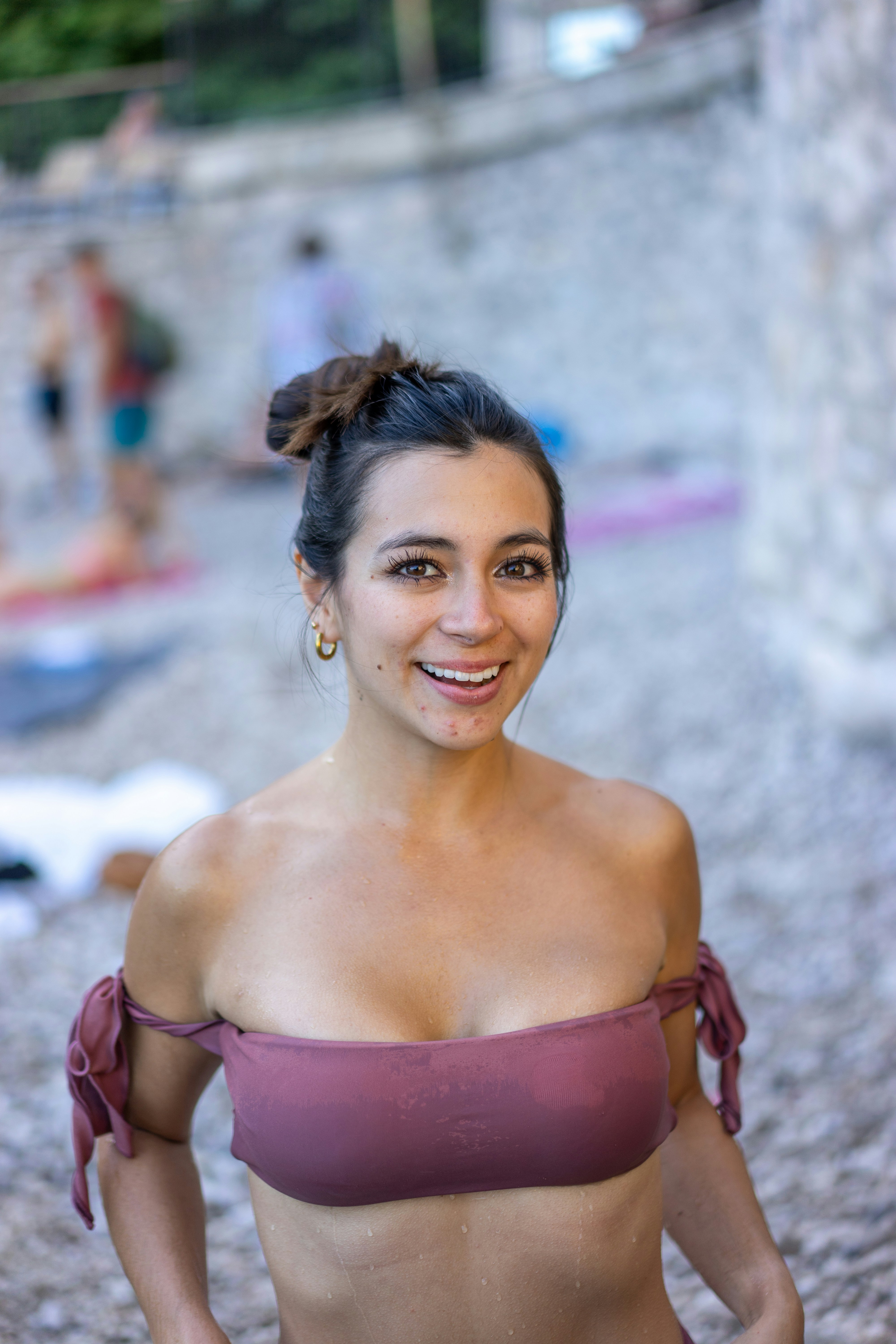 a woman in a bikini posing for a picture