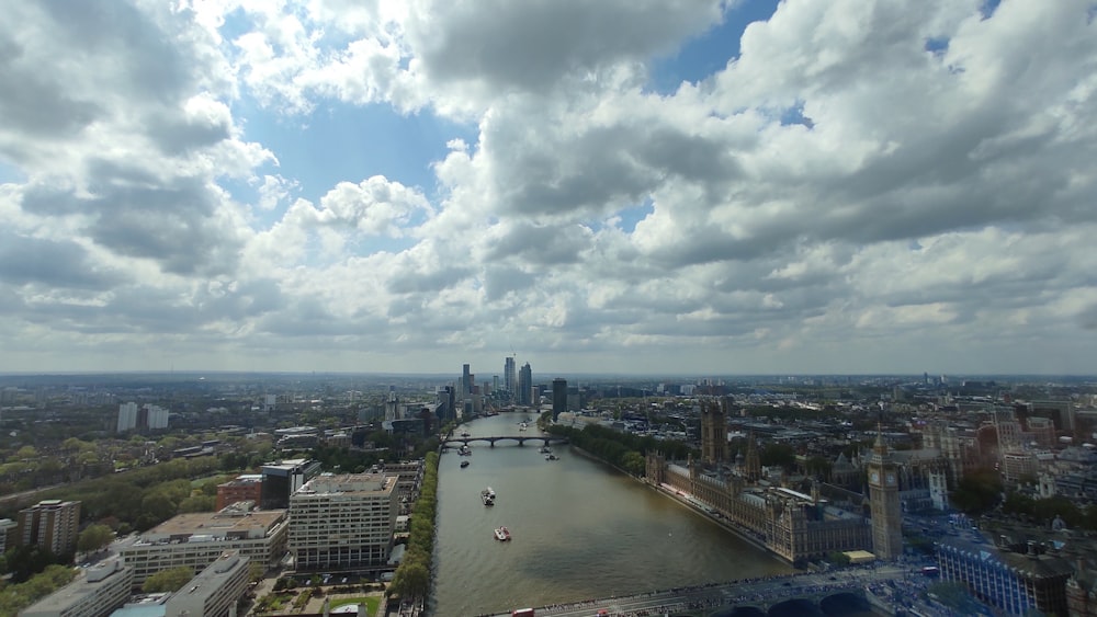 an aerial view of a river and a city