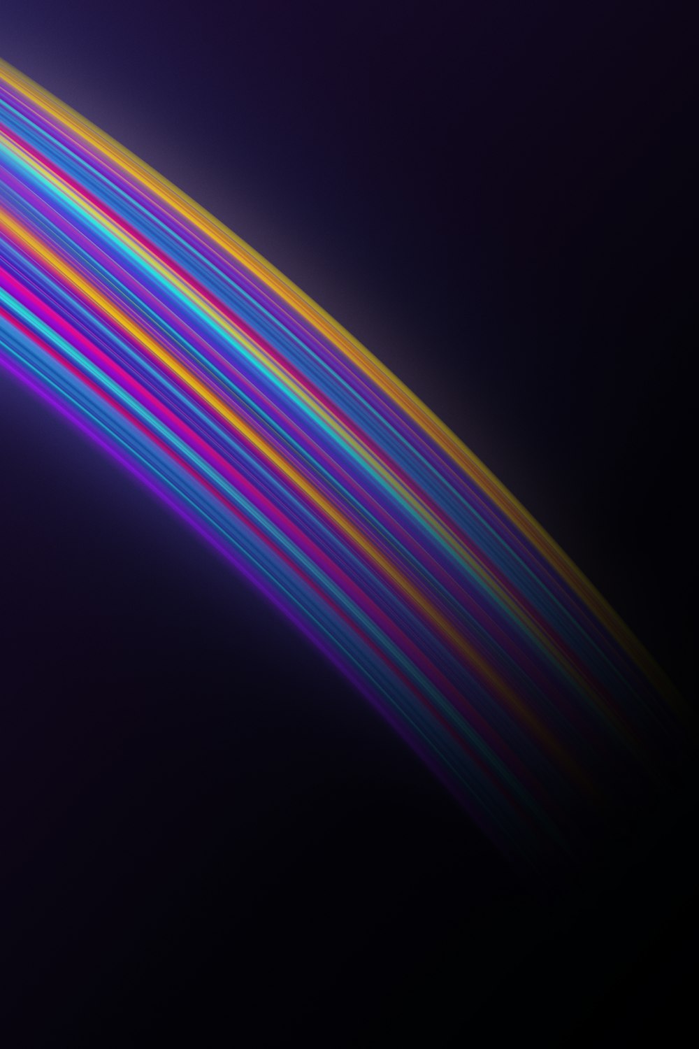 a dark background with multicolored lines on it