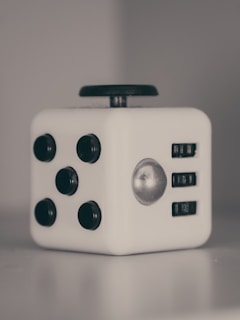 a close up of a dice on a table