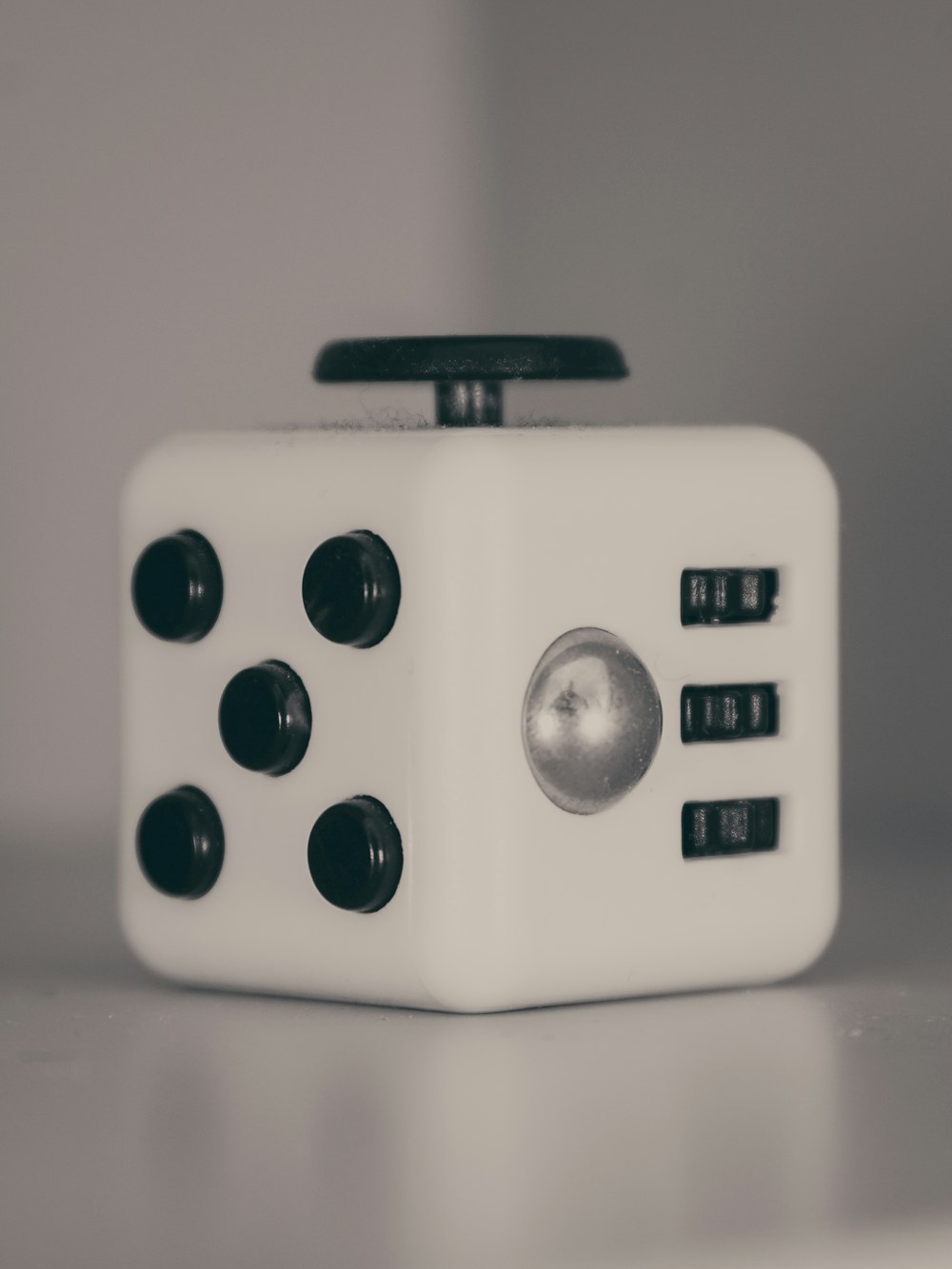 a close up of a dice on a table