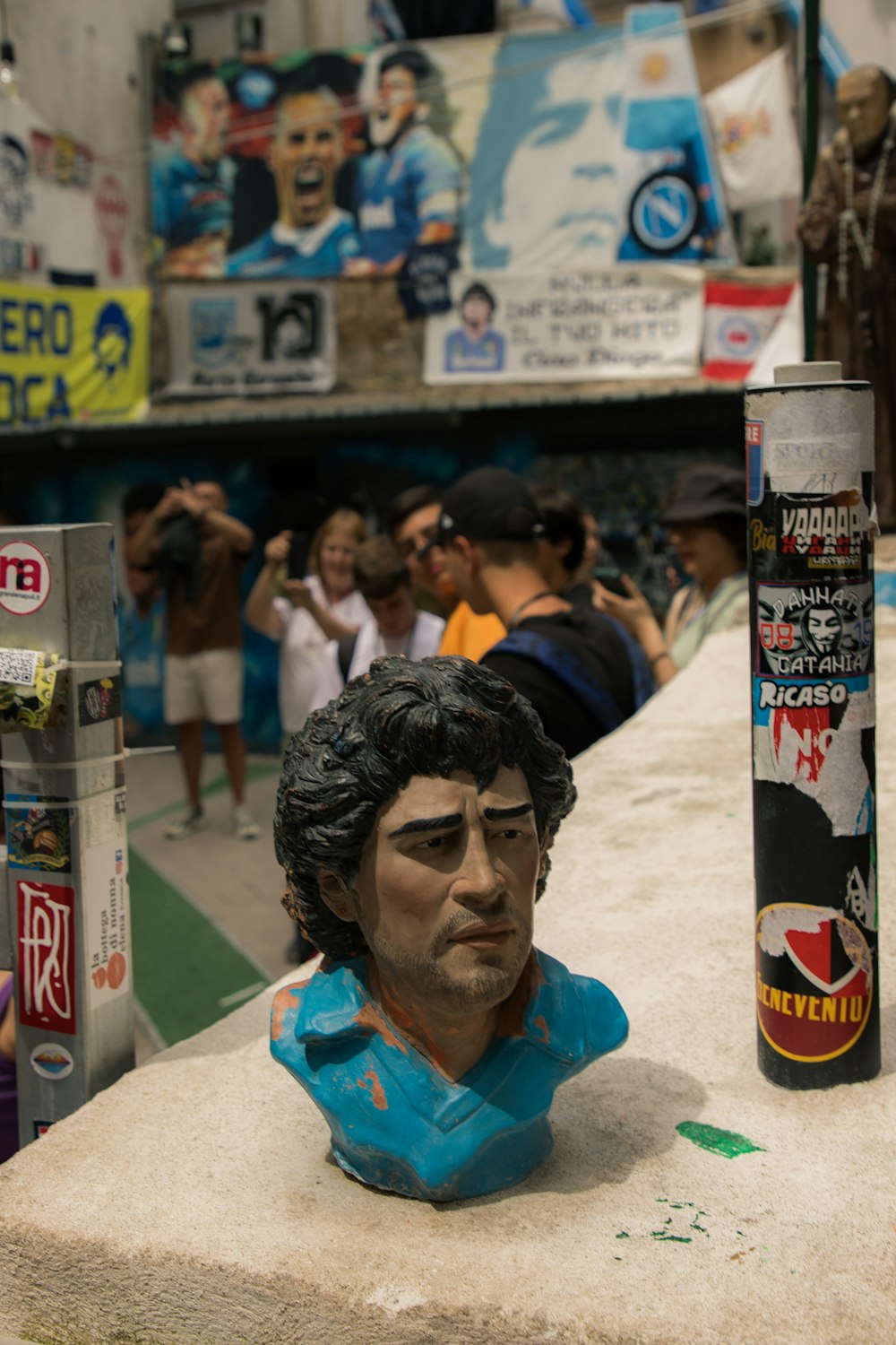 a busturine of a man is on display in a store