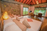 a bed room with two beds and a table