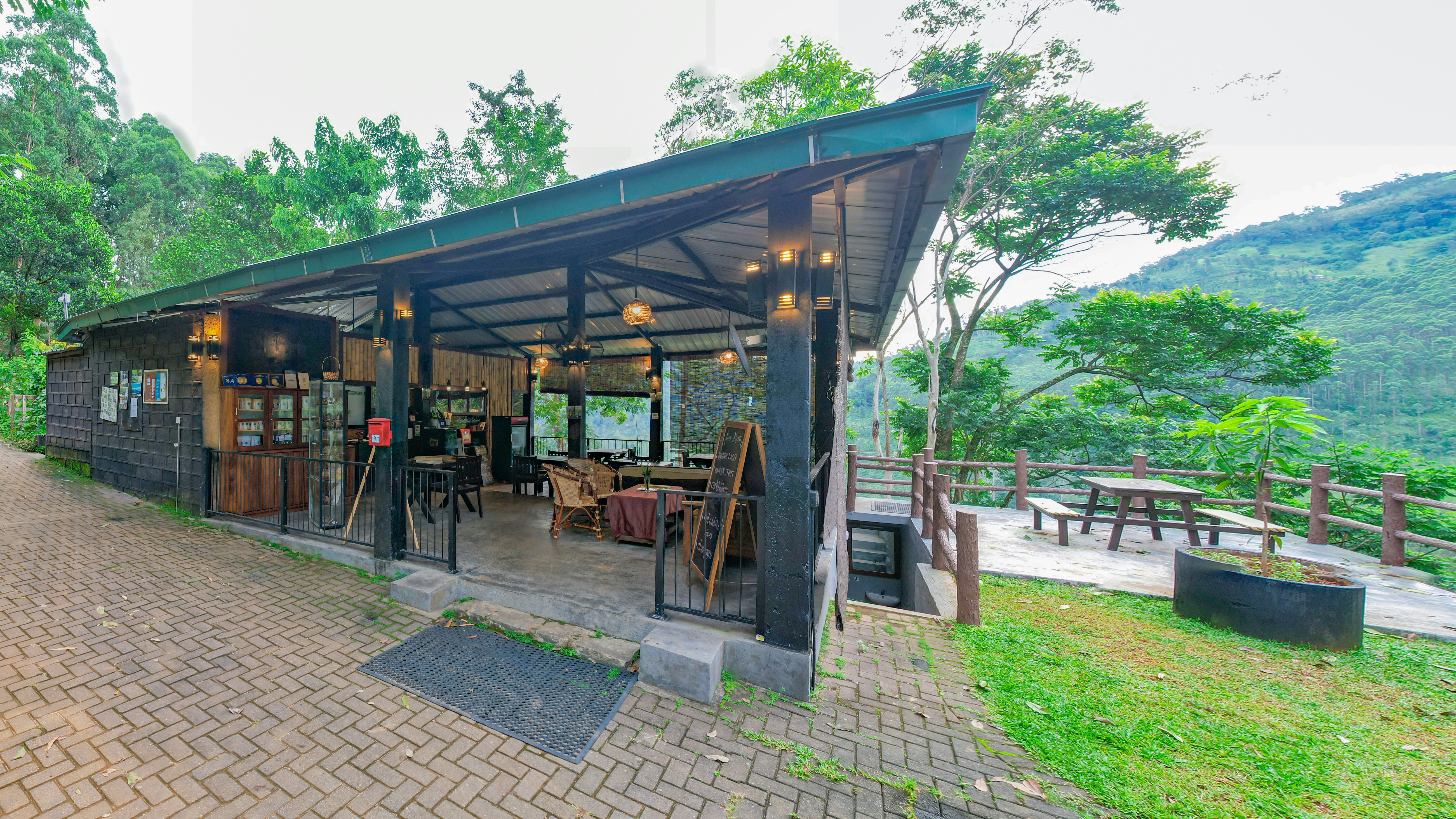 a small building with a lot of tables and chairs