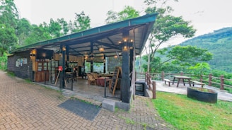 a small building with a lot of tables and chairs