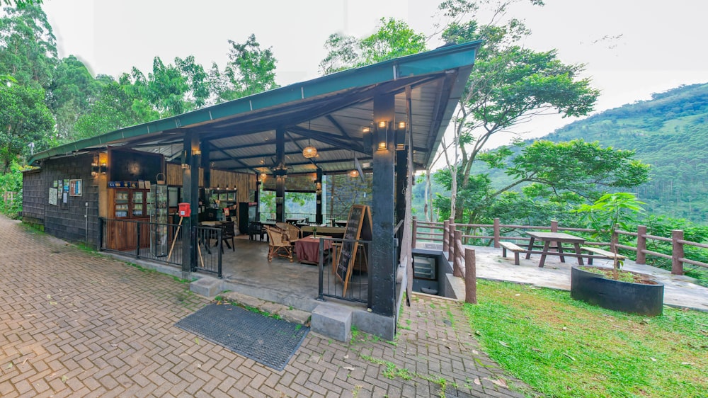 a small building with a lot of tables and chairs