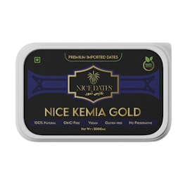 A rectangular packaging for 'NICE KEMIA GOLD' dates, featuring a black and gold design with text indicating it is premium imported, 100% natural, GMO-free, vegan, gluten-free, and contains no preservatives. The net weight is 500 grams.
