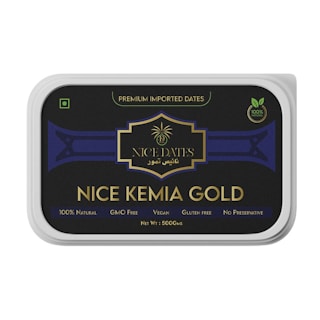 A rectangular packaging for 'NICE KEMIA GOLD' dates, featuring a black and gold design with text indicating it is premium imported, 100% natural, GMO-free, vegan, gluten-free, and contains no preservatives. The net weight is 500 grams.