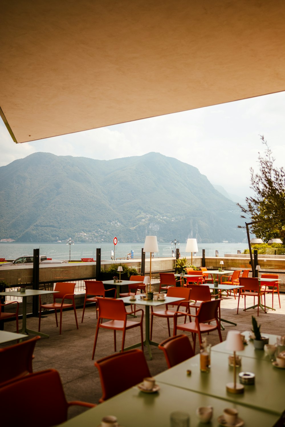 a restaurant with a view of a mountain range