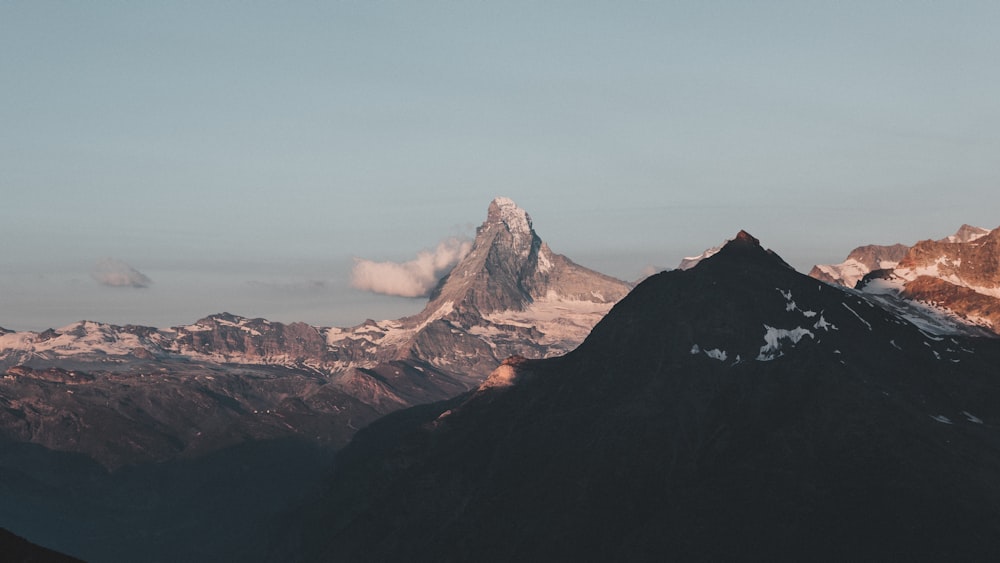 a view of a mountain range at sunset