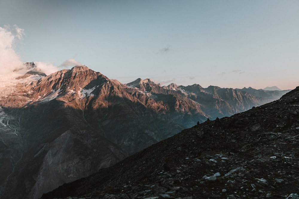 a person standing on top of a mountain