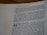 A close-up view of an open Bible page, showing text from the book of Jeremiah. The text appears in a column format with chapter and verse numbers visible. The page has a slightly blurred focus, with emphasis on specific verses of a religious text.