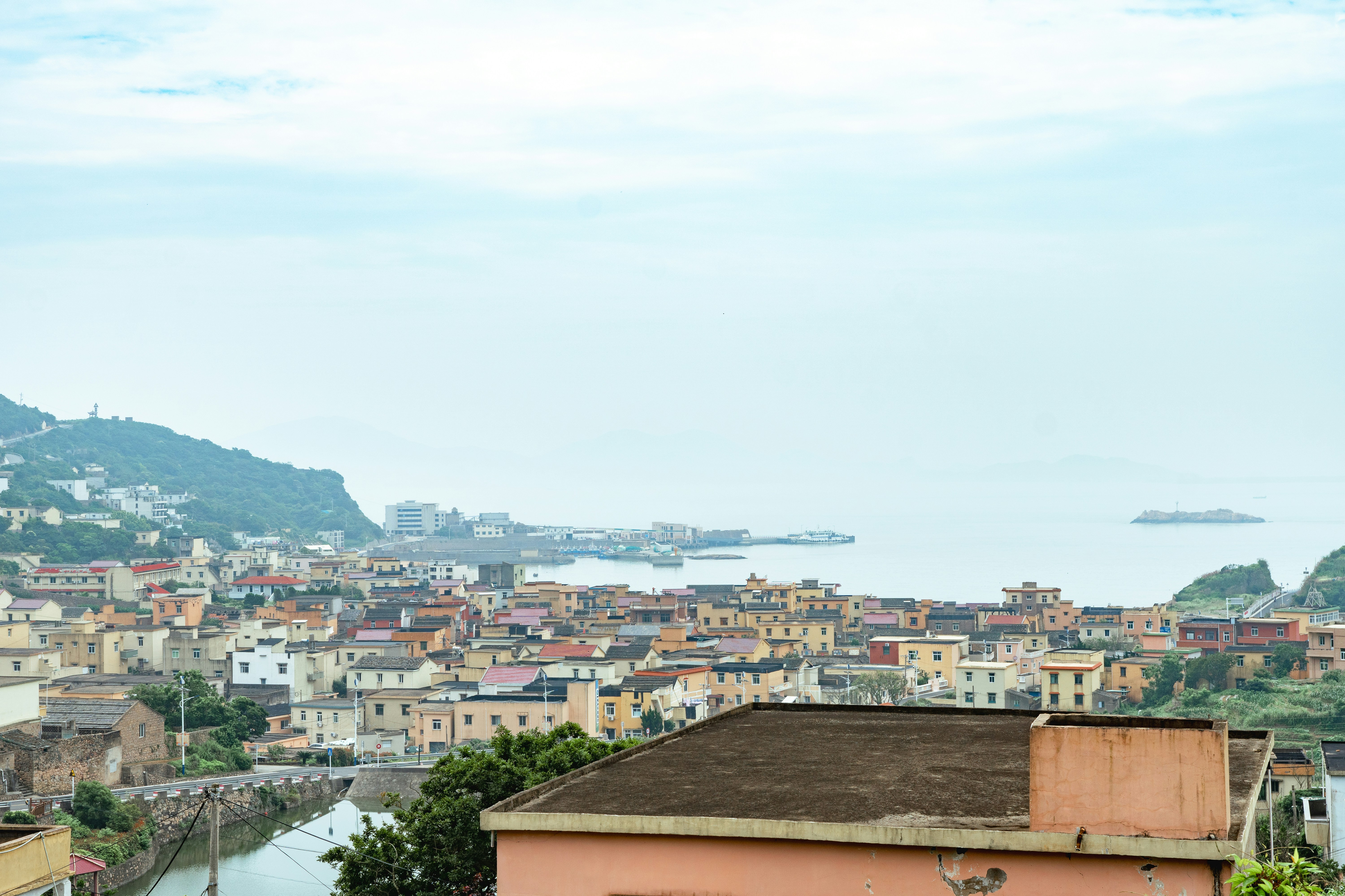 a view of a city and a body of water