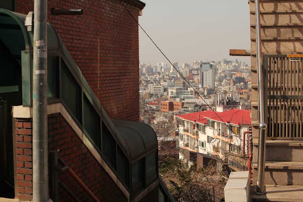 a view of a city from the top of a building