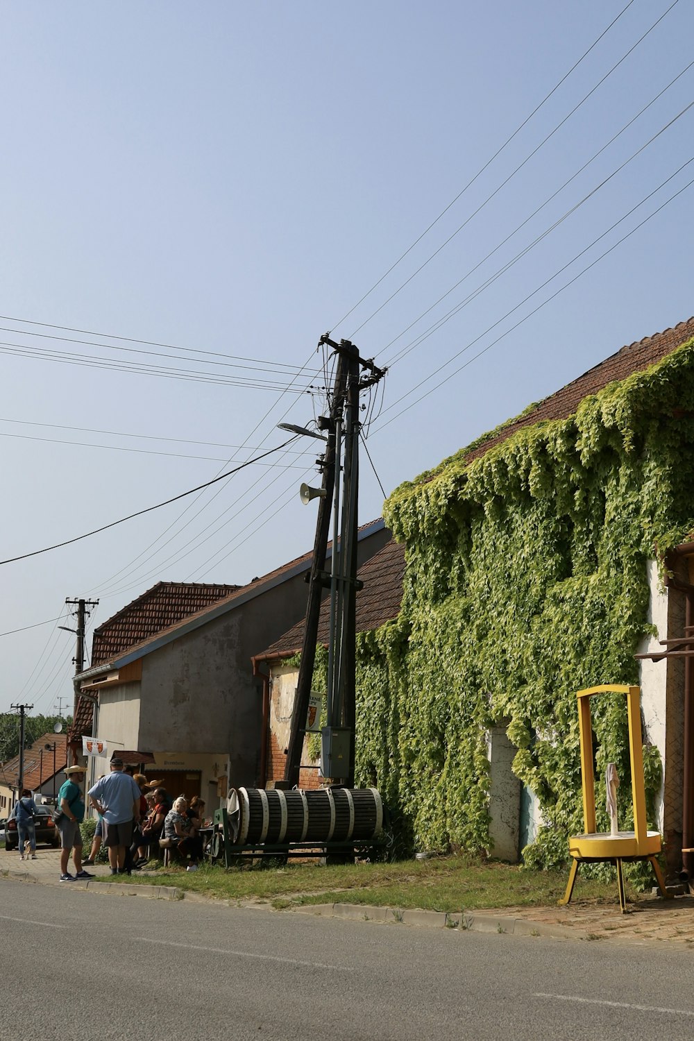 a group of people standing outside of a building