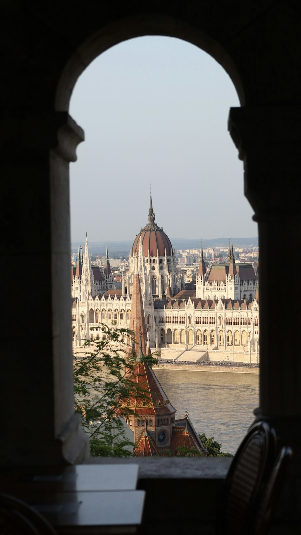 a view of a large building from a window