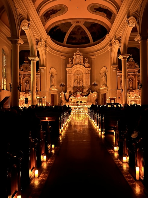 A cozy interior of a church with warm lighting and inviting decor.