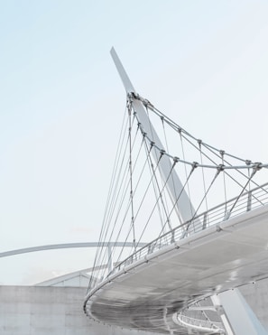 A minimalist urban bridge concept that merges structural elegance with cutting-edge materials.