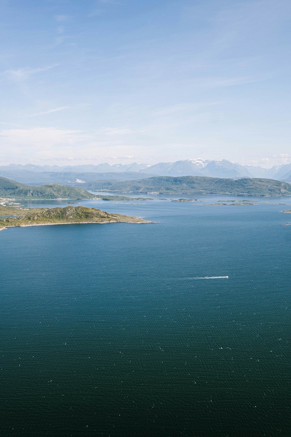 a large body of water surrounded by mountains