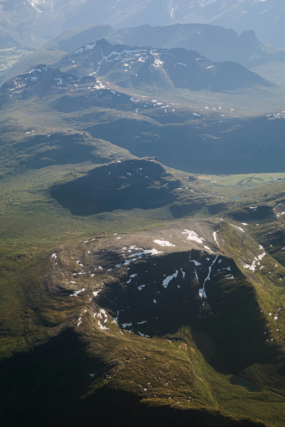 a view of a mountain range from an airplane