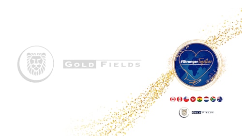 A white background with two main graphic elements. On the left, there is a logo of a stylized lion within a circle, accompanied by the text 'Gold Fields' in a grey font. On the right, a circular emblem with a blue background features a heart outline and the words '#StrongerTogether' overlaid on a map. A trail of gold confetti connects these elements, and below the emblem, several national flags are displayed in a row.