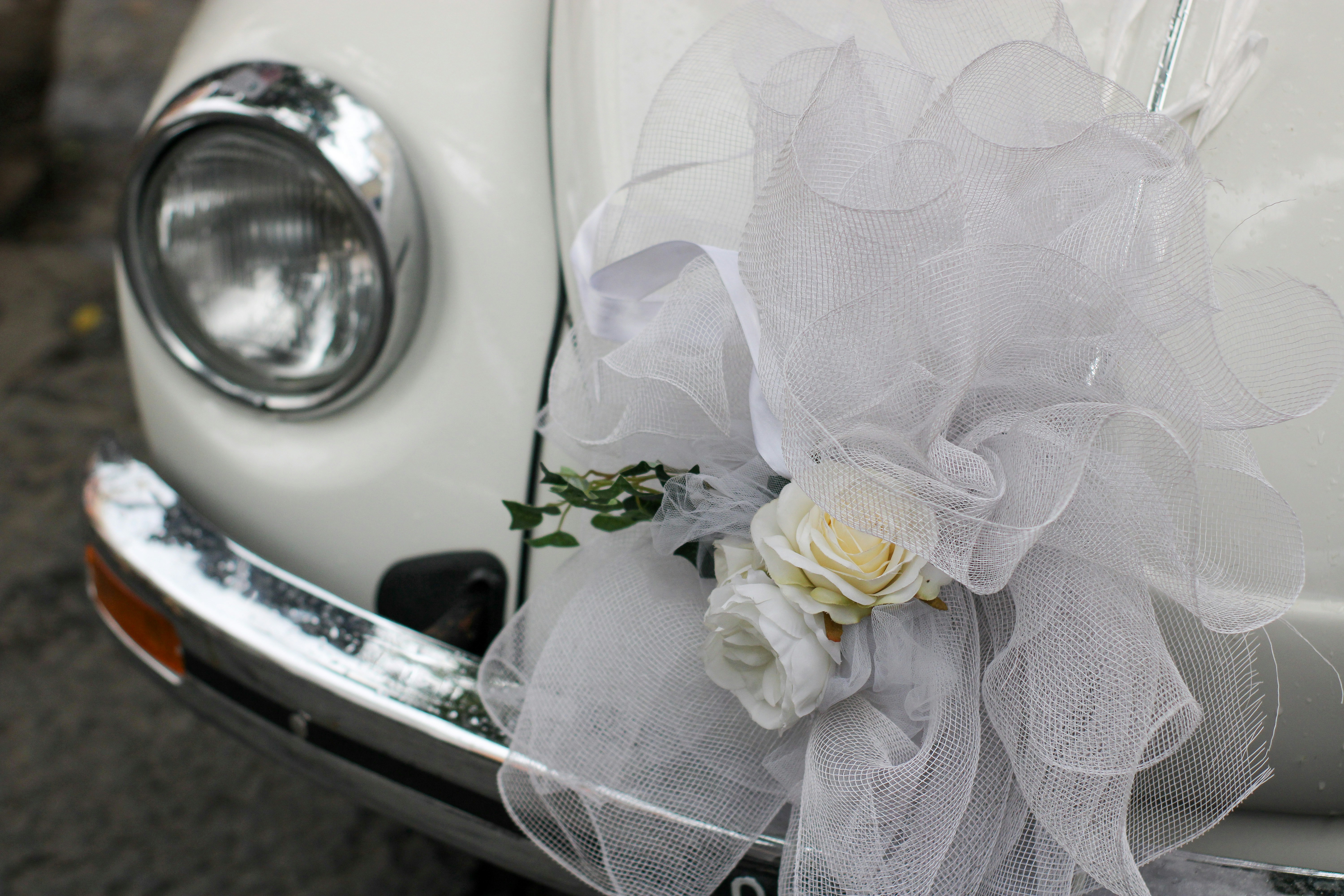 White car with bouquet