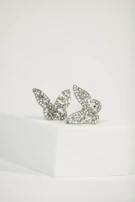 Pair of custom earrings shaped like miniature planets with subtle sparkle.