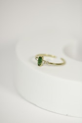 A sharp, detailed product shot showcasing a handcrafted jewelry piece on a minimalist background.