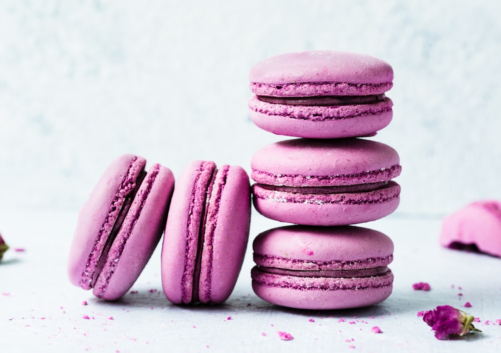 a stack of pink macaroons sitting on top of each other