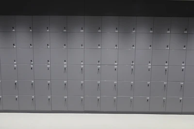 A neat row of lockers representing secure locker services offered by the society.