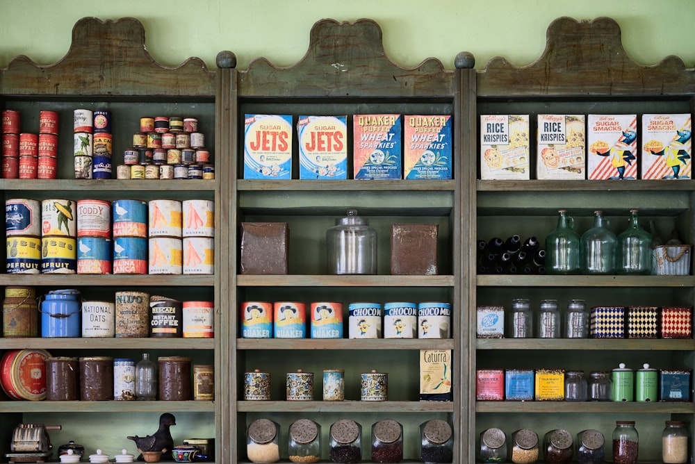 a shelf filled with lots of different types of food