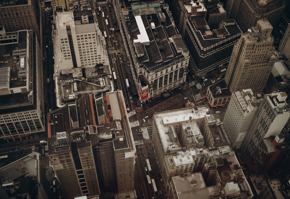 an aerial view of a city with tall buildings