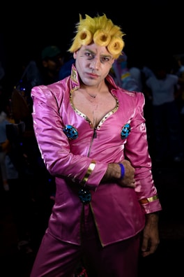 A vibrant pink and gold themed photo showcasing women celebrating their individuality.