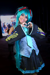 A cheerful young person selecting colors and sizes on a digital order form for a custom anime-themed tote bag.