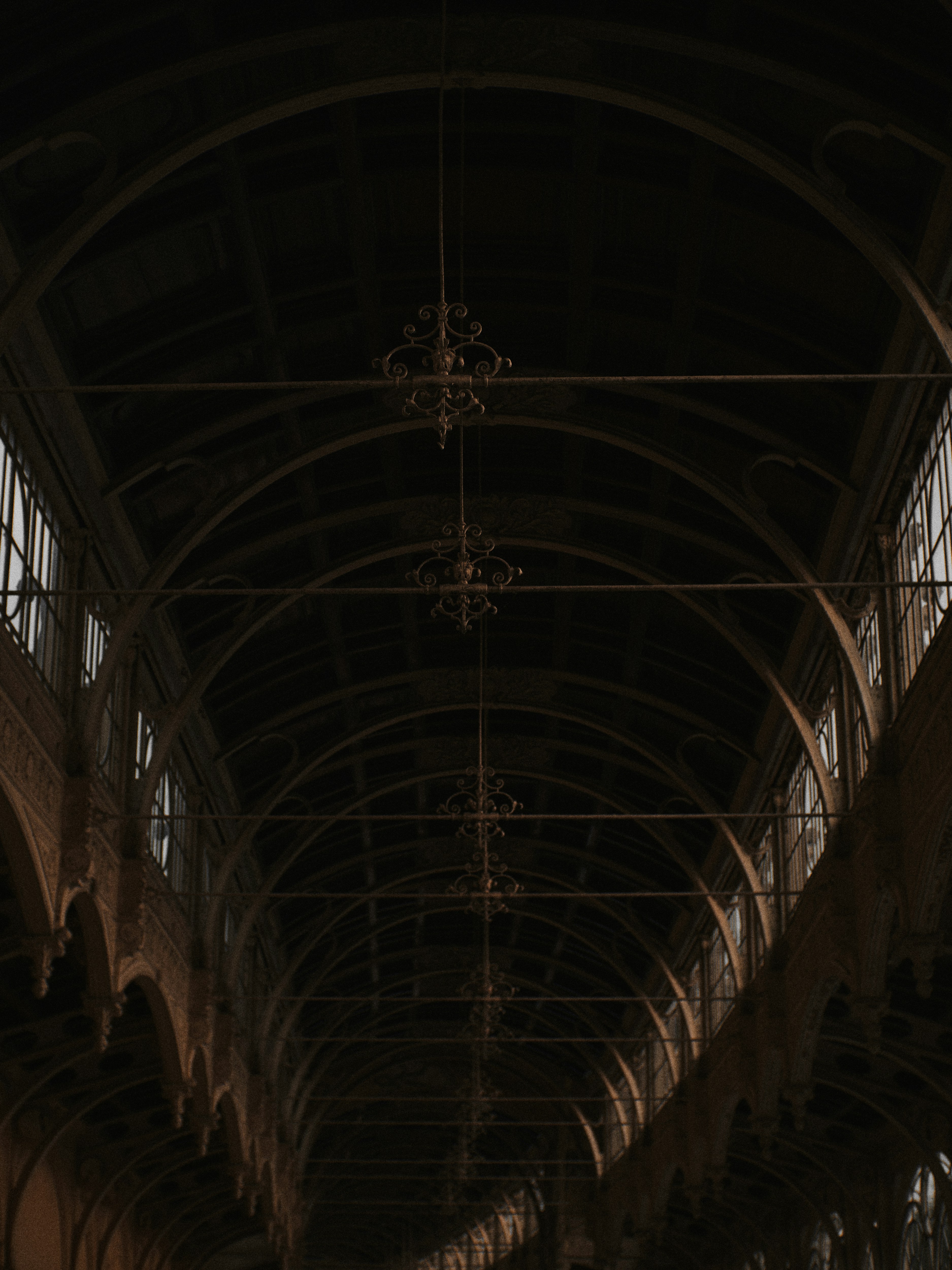 a train station with a clock on the wall