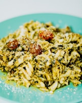 A quick pasta dish tossed with cherry tomatoes, spinach, and a sprinkle of parmesan.