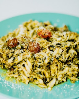 A quick pasta dish tossed with cherry tomatoes, spinach, and a sprinkle of parmesan.