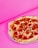 A pepperoni pizza is placed against a vibrant pink background, showcasing a mix of crispy, charred crust and melted cheese topped with slices of pepperoni.