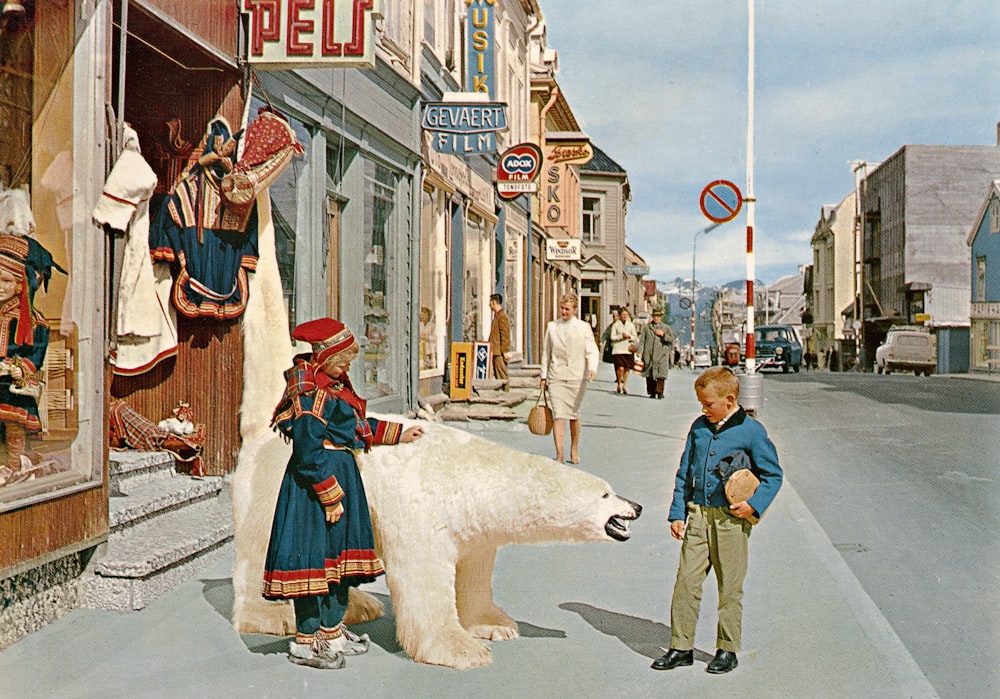 a painting of a boy standing next to a polar bear
