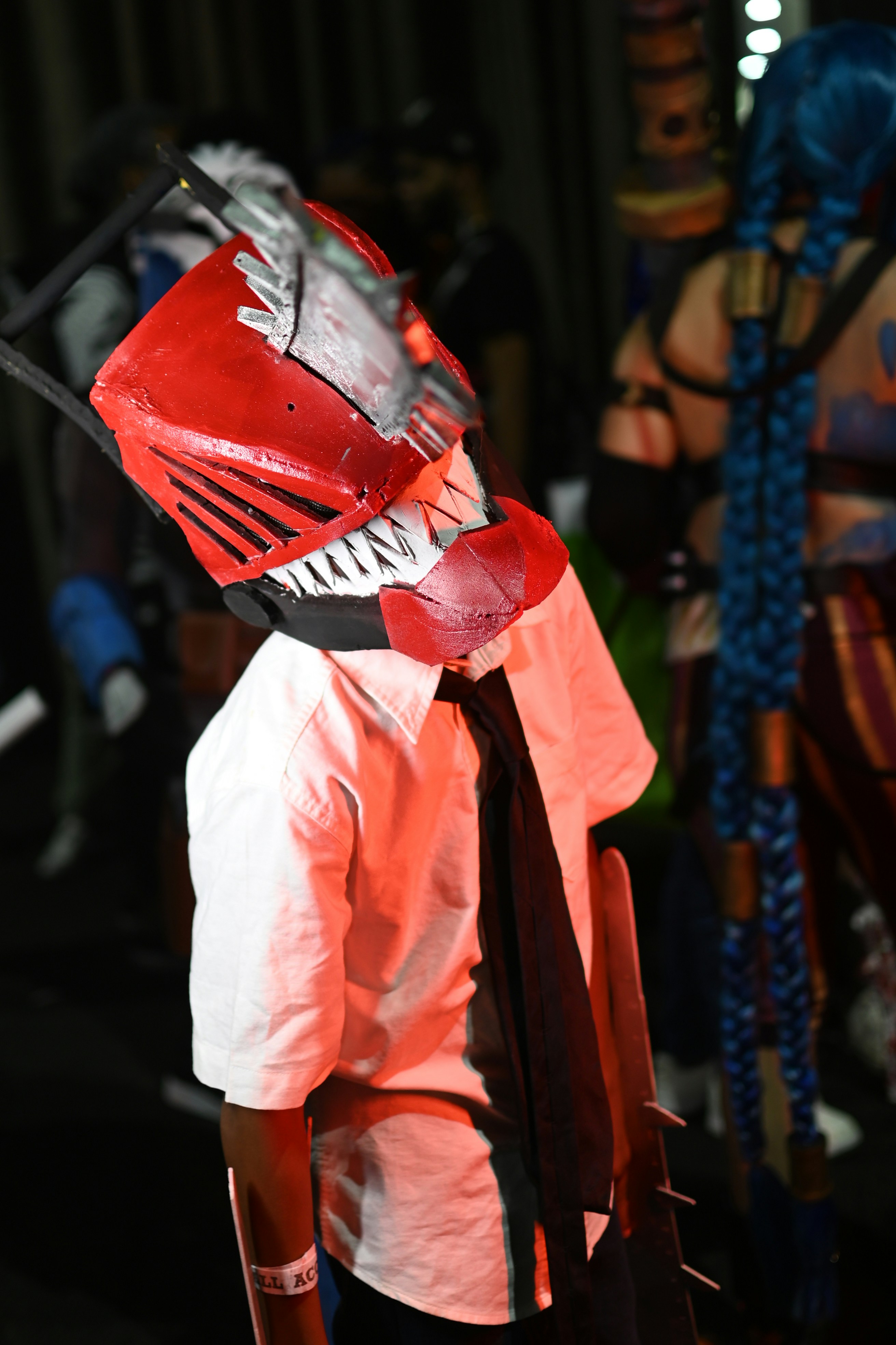man wearing red mask and tie